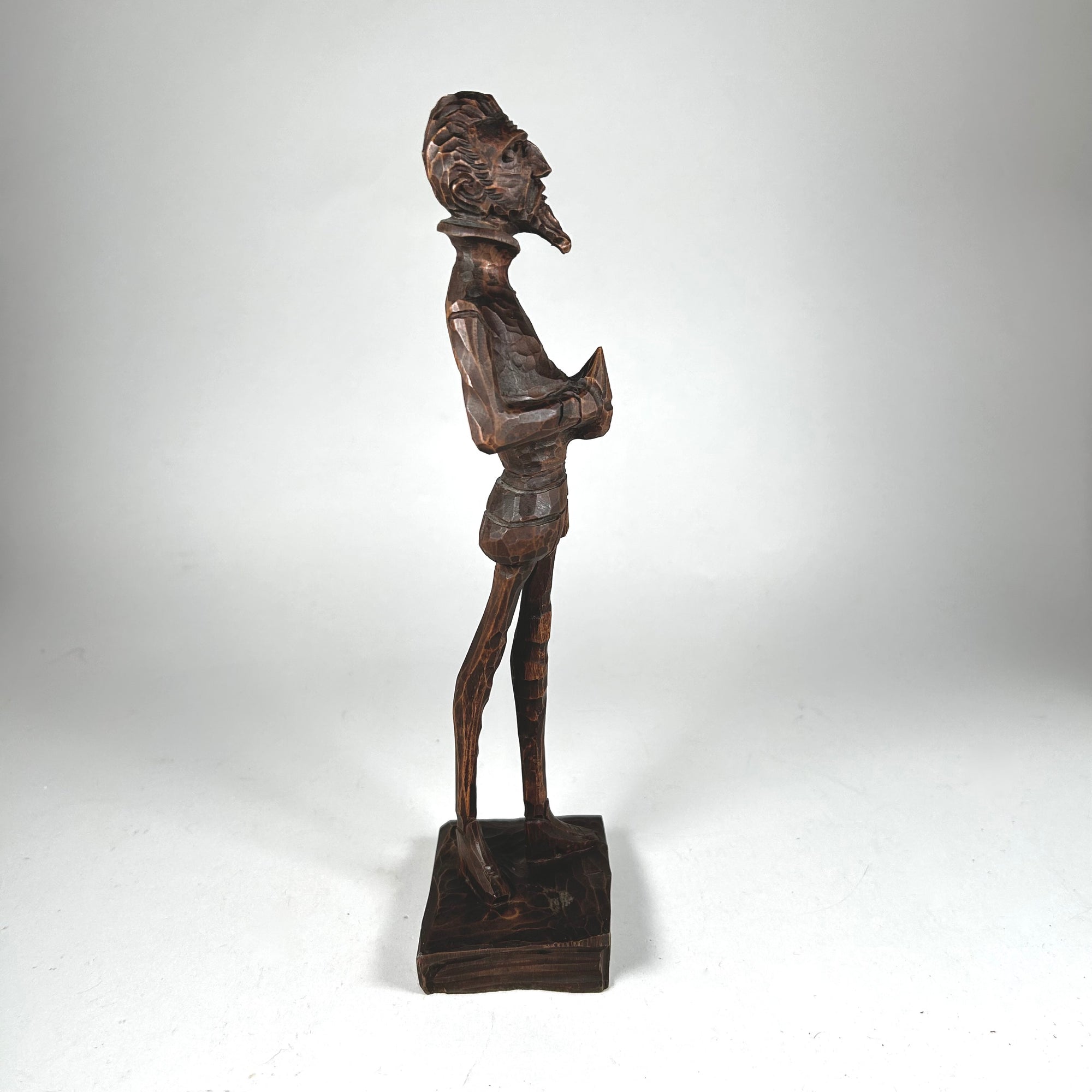 Cervantes Figure Standing on a Book Elongated Carved Wood