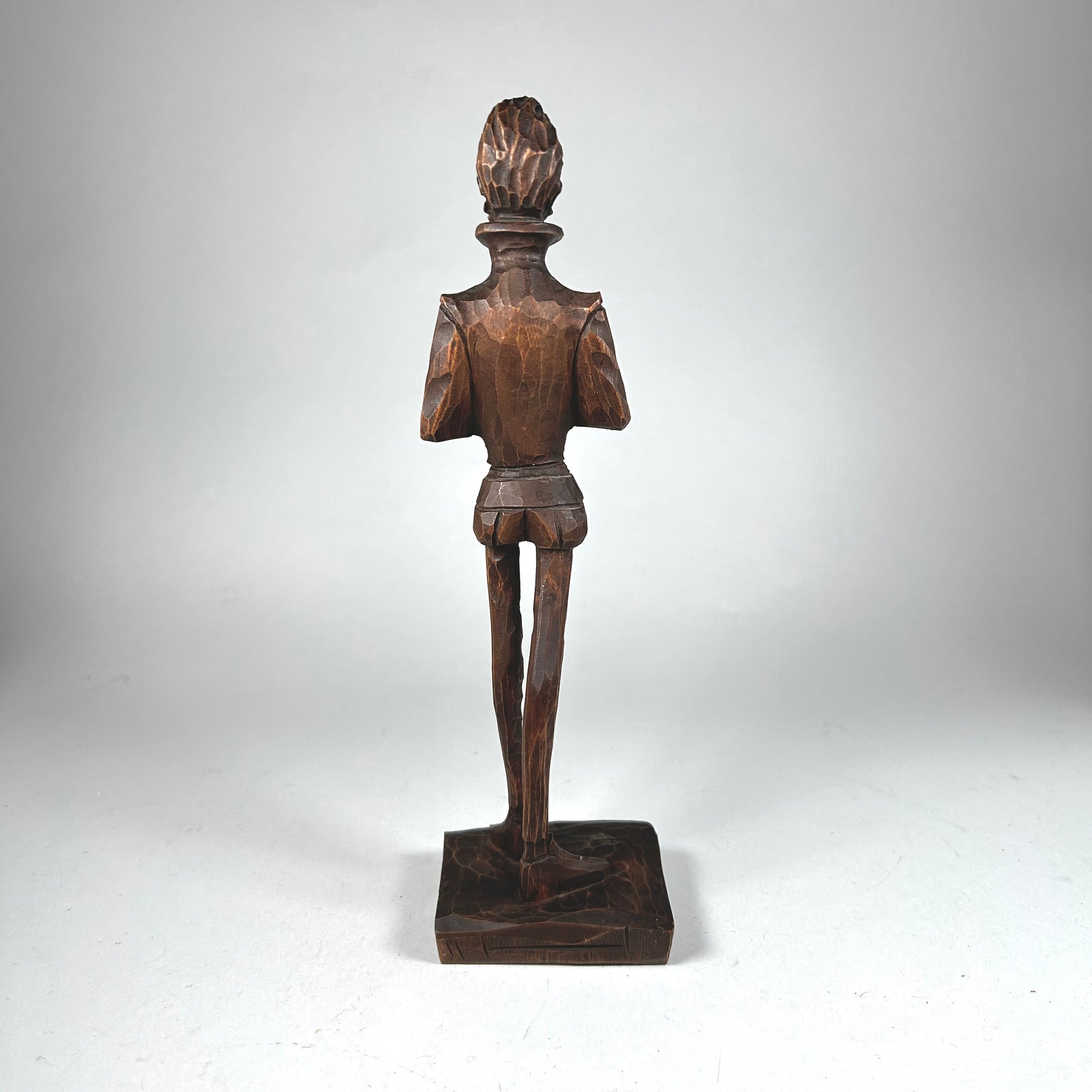 Cervantes Figure Standing on a Book Elongated Carved Wood