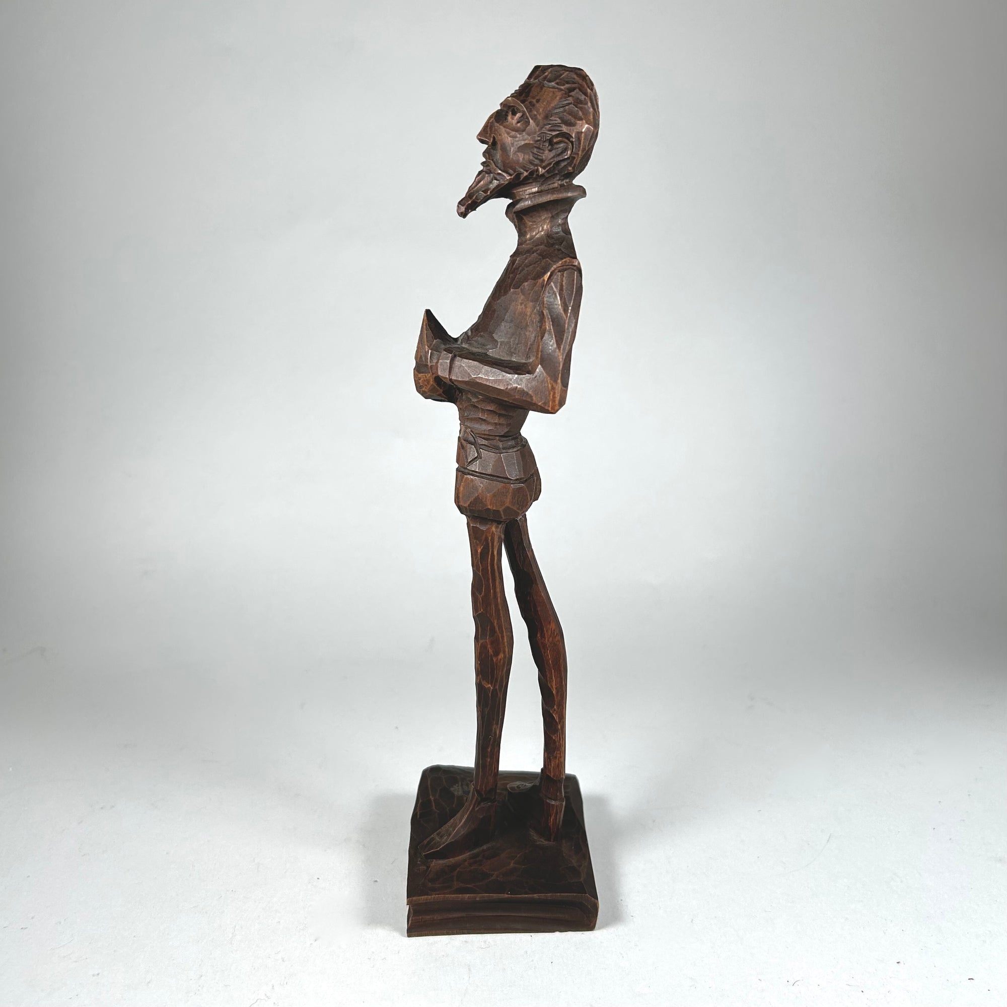 Cervantes Figure Standing on a Book Elongated Carved Wood