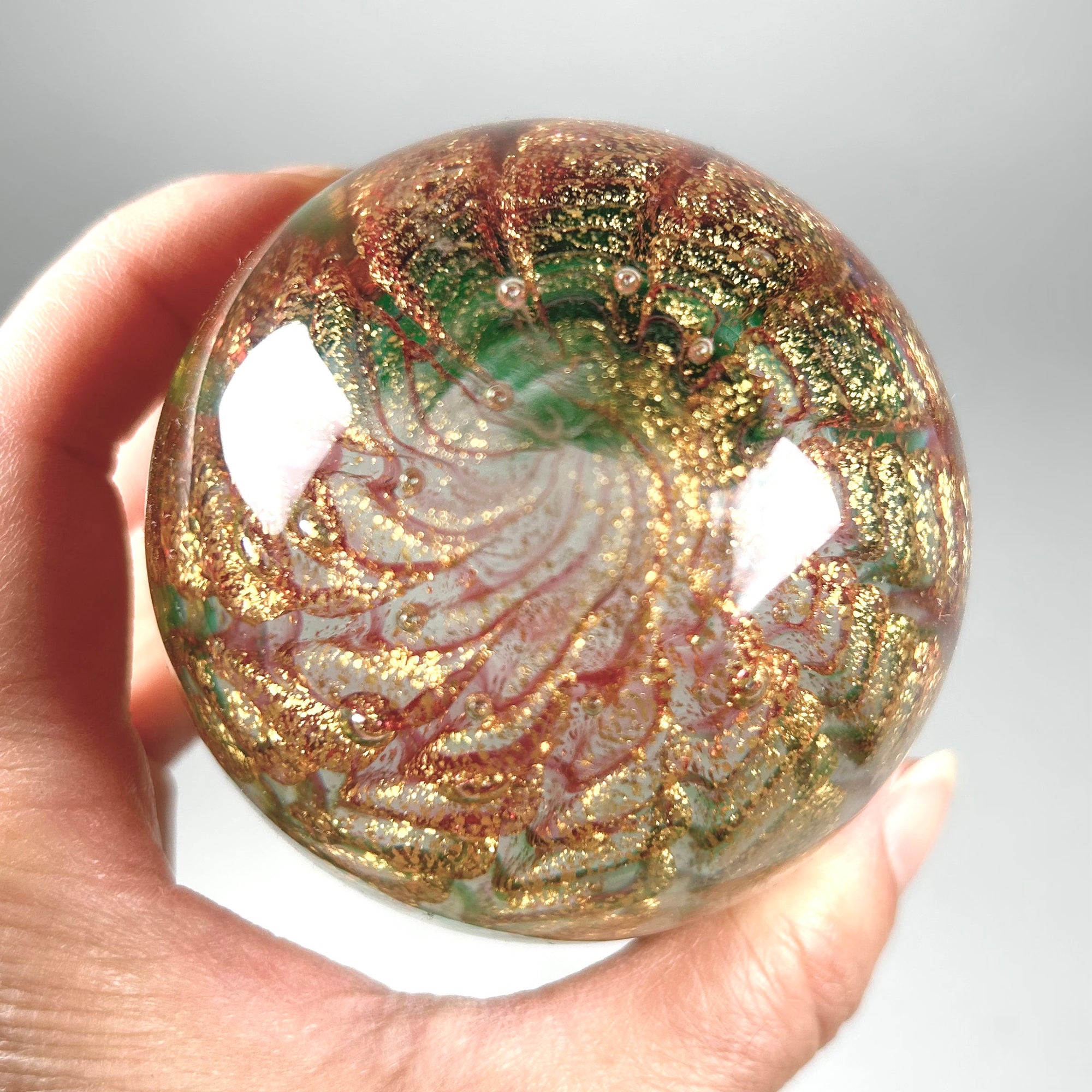 Iridescent Egg Shaped Art Glass Paperweight in Green and Red