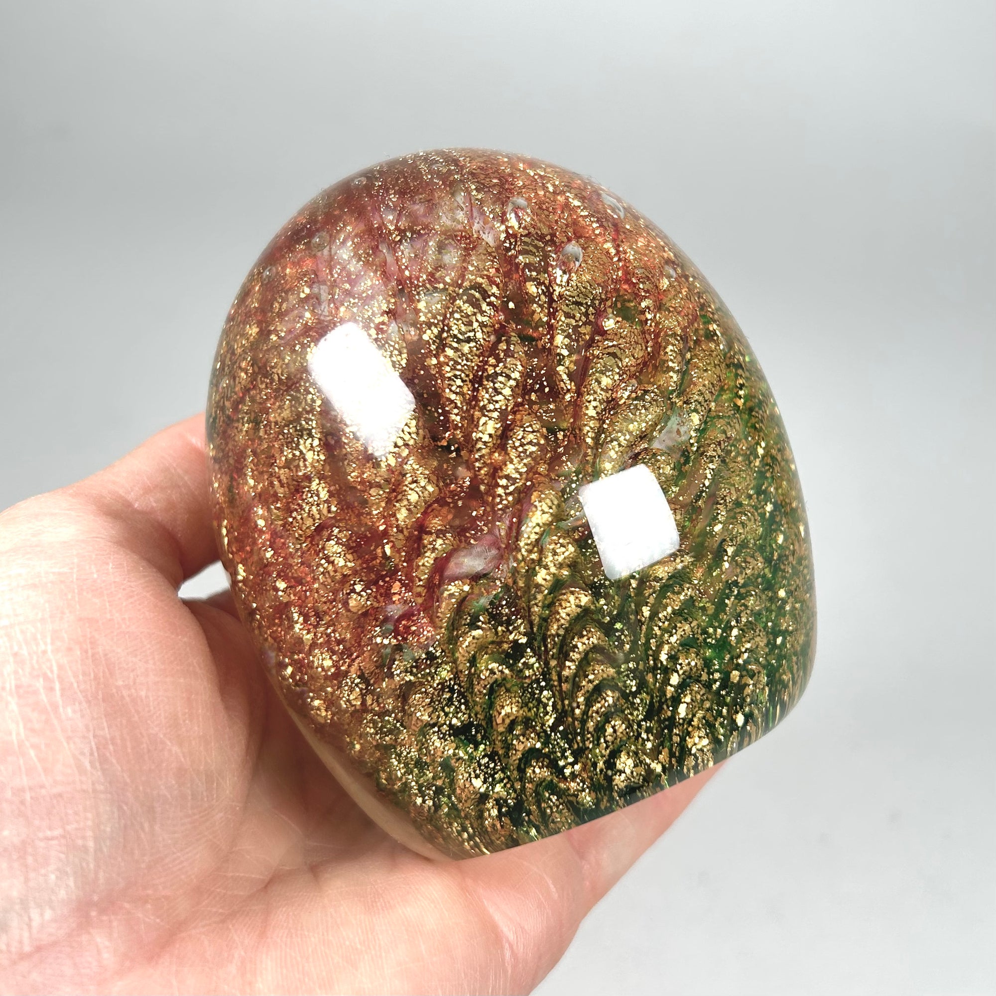 Iridescent Egg Shaped Art Glass Paperweight in Green and Red