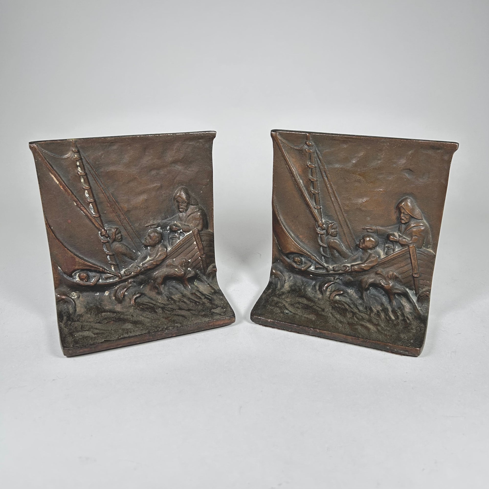 Sea, Waves, and Fisherman Design Metal Bookends