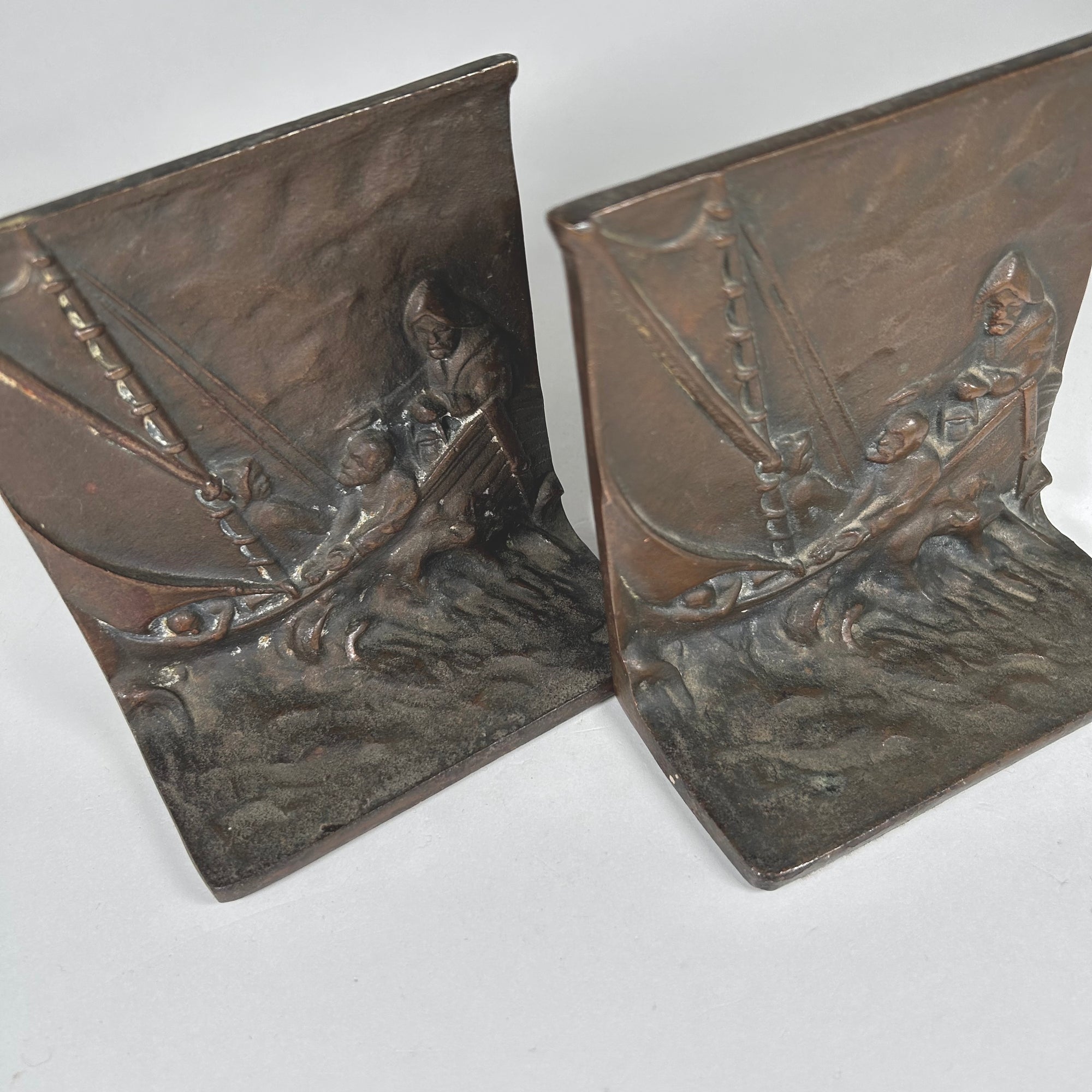 Sea, Waves, and Fisherman Design Metal Bookends