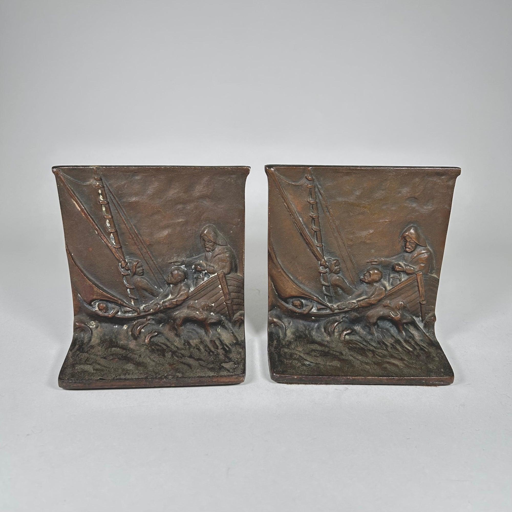 Sea, Waves, and Fisherman Design Metal Bookends