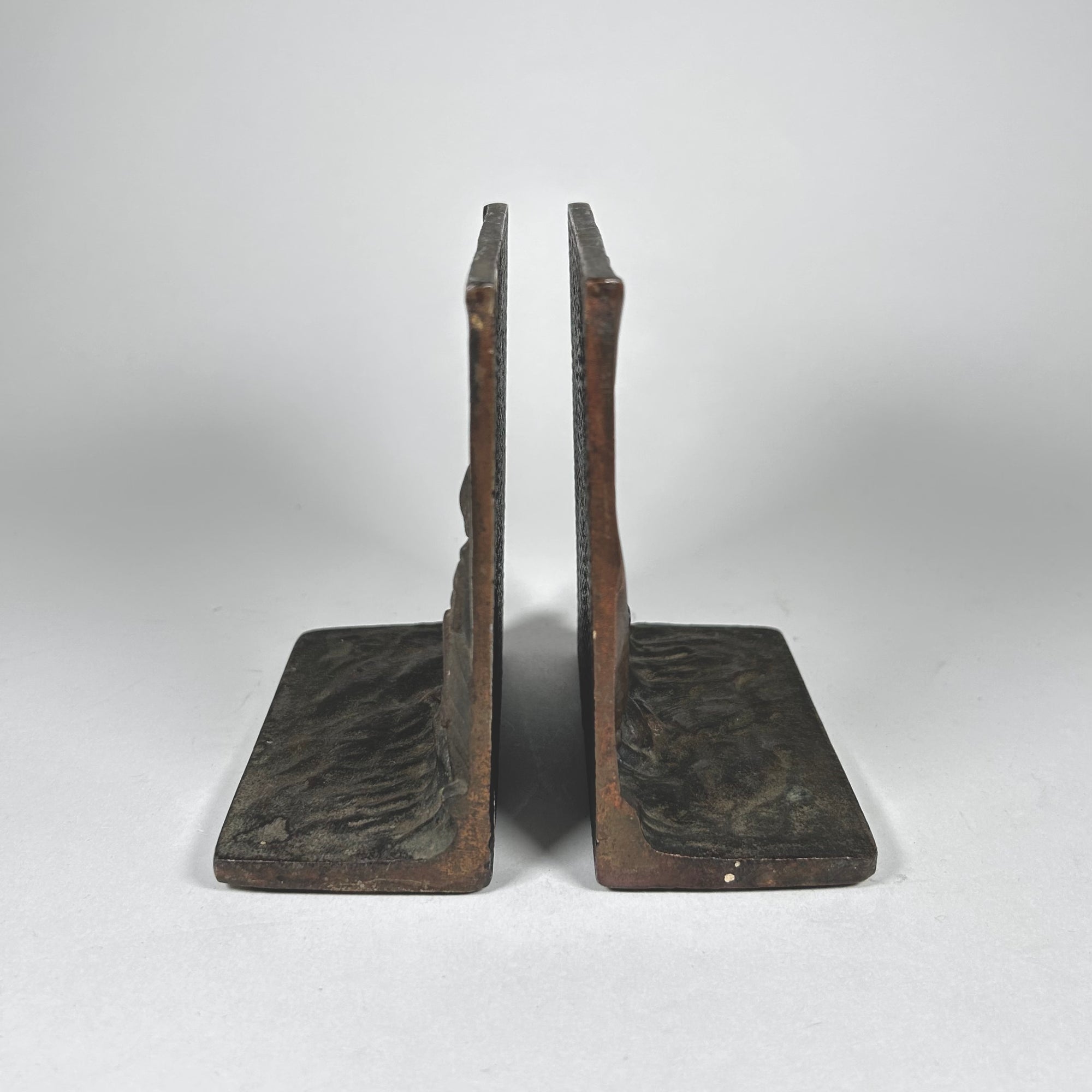 Sea, Waves, and Fisherman Design Metal Bookends