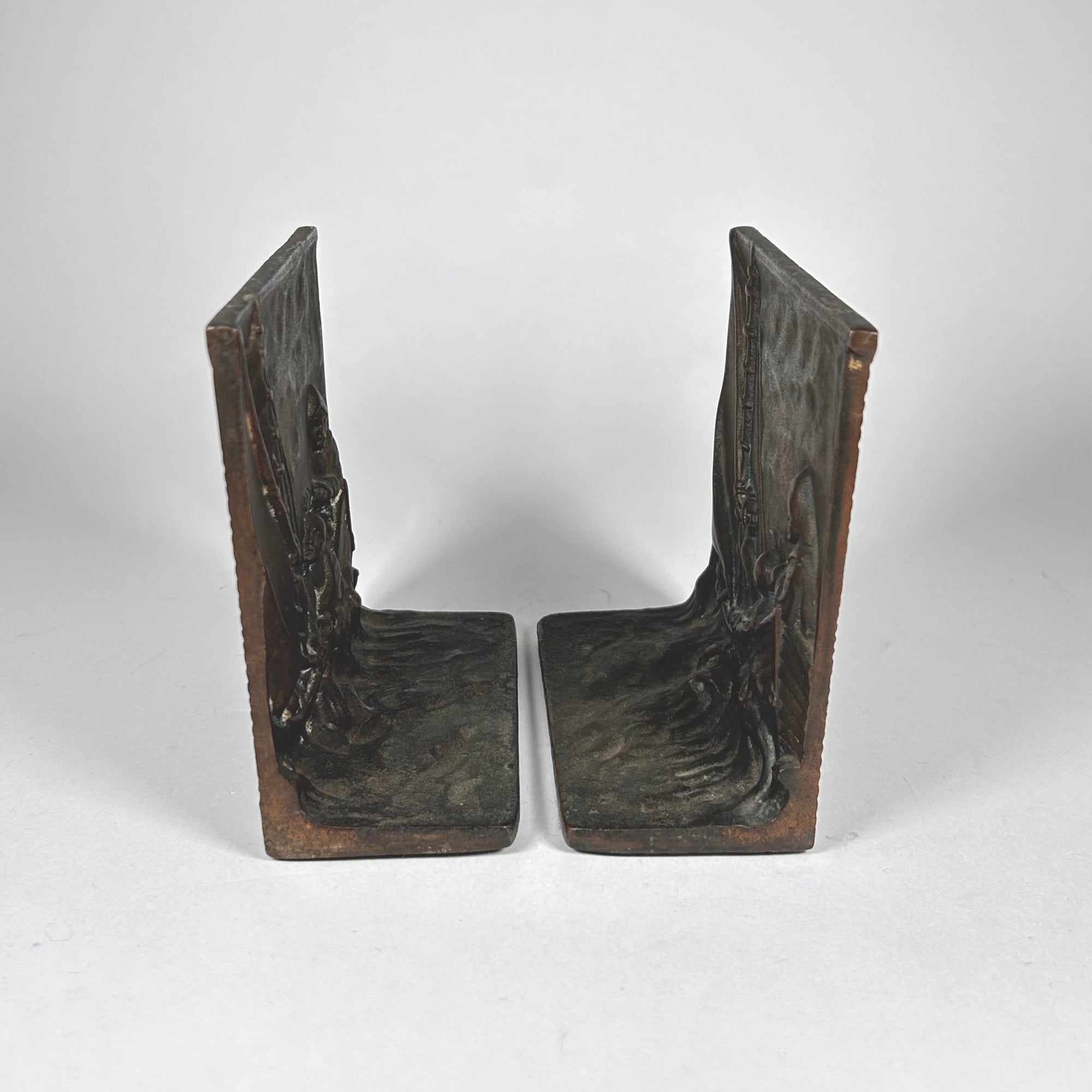 Sea, Waves, and Fisherman Design Metal Bookends