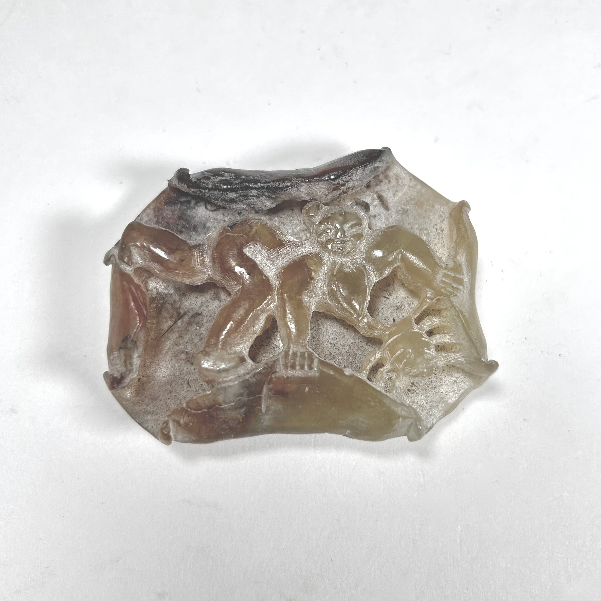Carved Asian Decoration with a Girl and Crab Motif