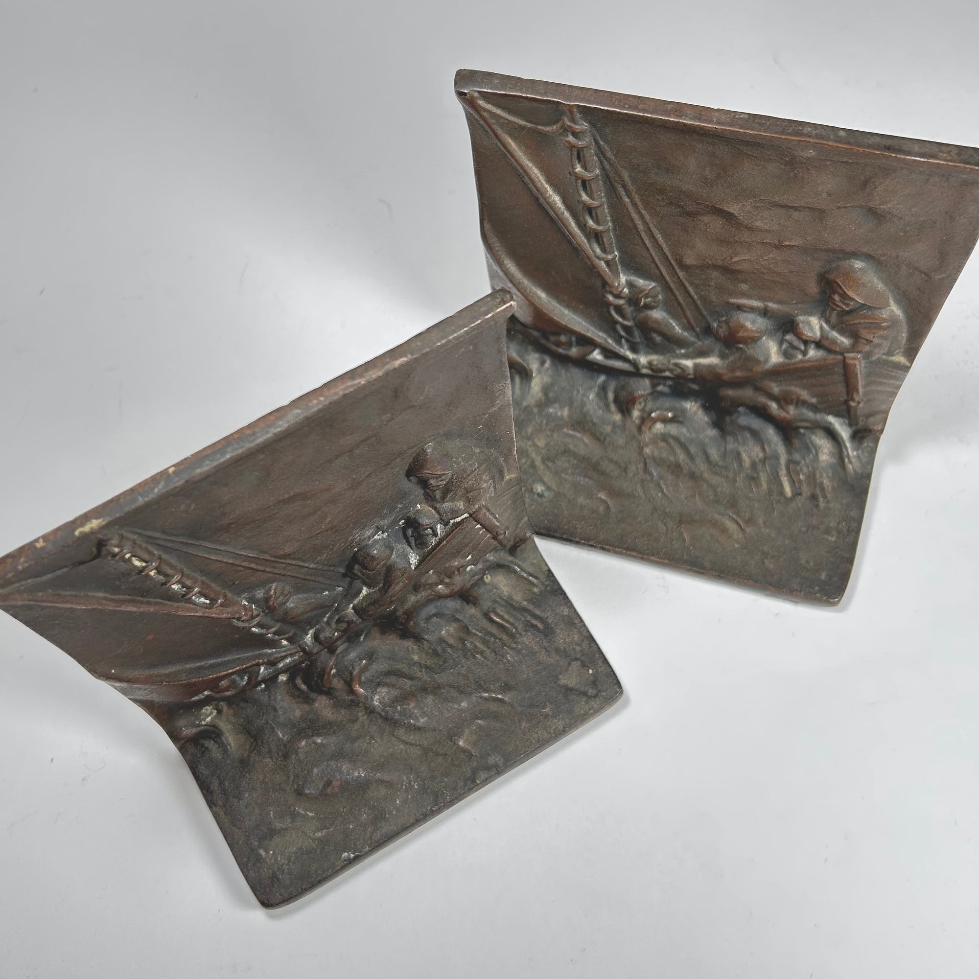 Sea, Waves, and Fisherman Design Metal Bookends