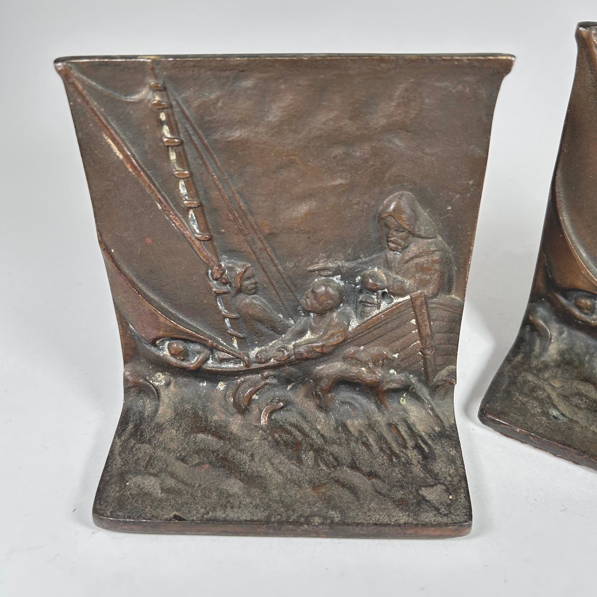 Sea, Waves, and Fisherman Design Metal Bookends