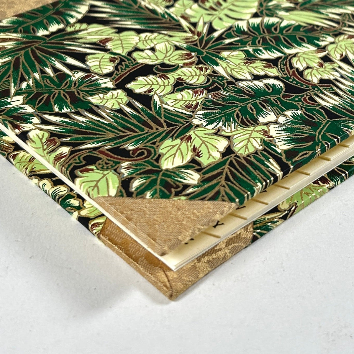 Address Book with Lush Green Leaves Paper and Golden Silk Binding