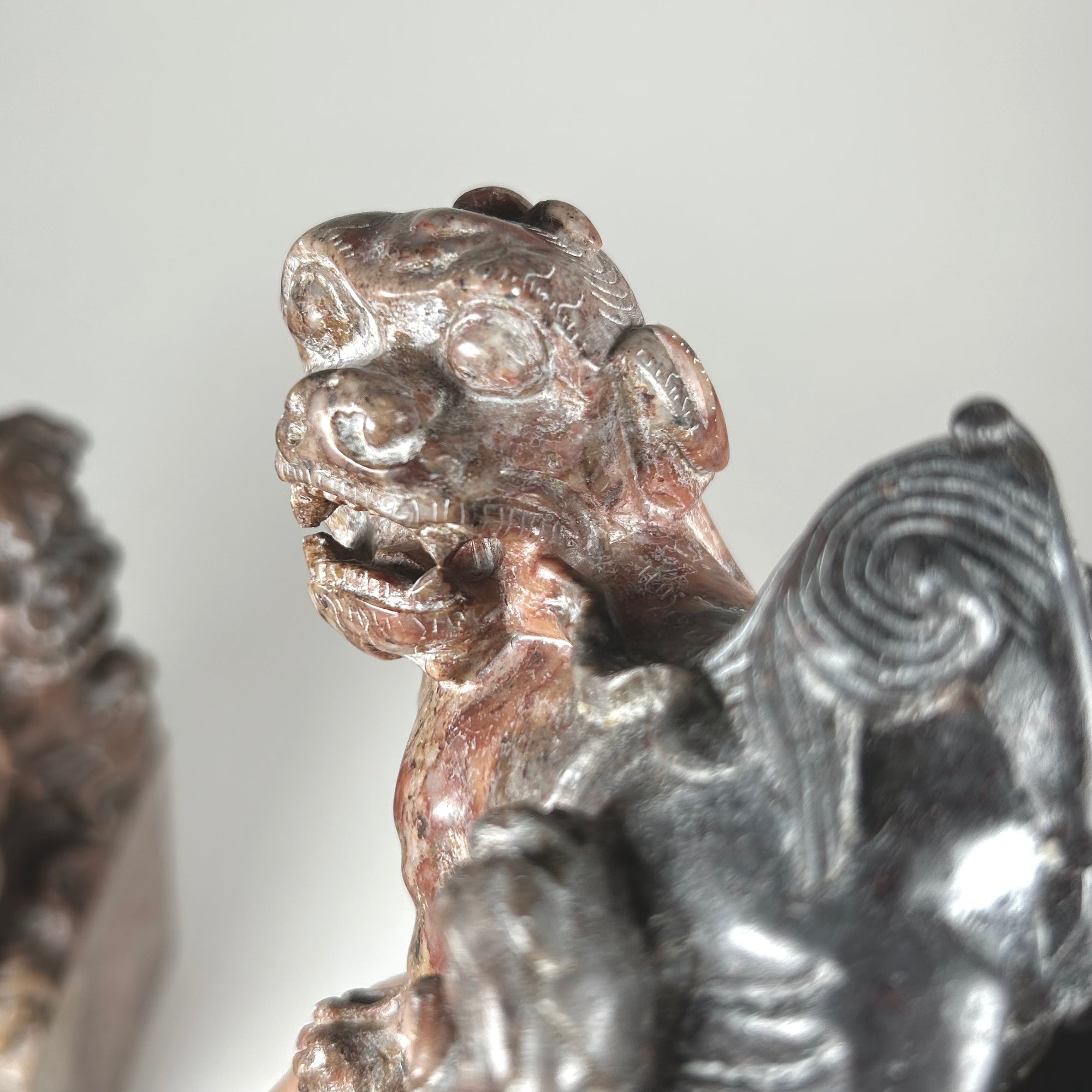 Small Hardstone Foo Dog Pair on Plinths - Carved with Floral Design - Red / Grey Stone